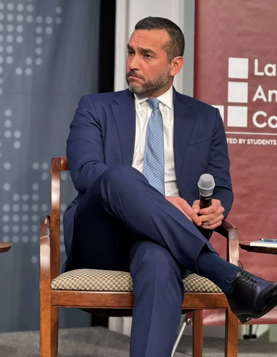 Carlos Ruiz Hernandez listening during a panel discussion.