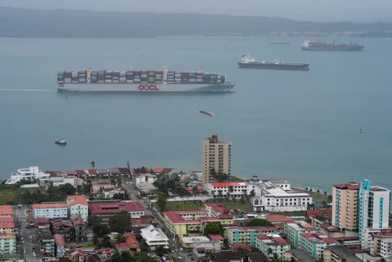 Cargo ships passing through the Panama Canal